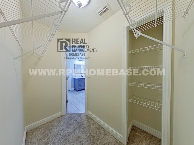 Building Photo - Elegant Gated Community Home with Water Ac...