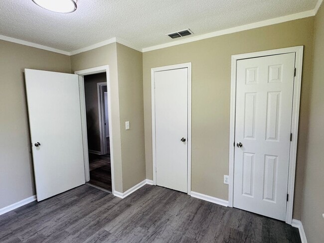 Building Photo - 4-Bedroom that has it all !