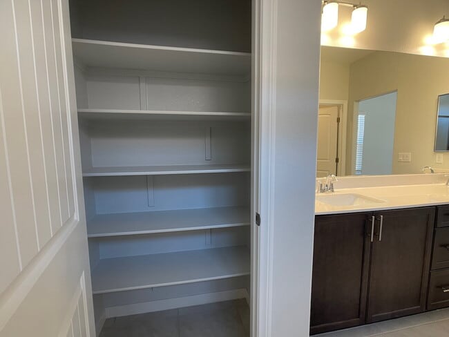 Building Photo - 4 BED 2 BATH 2 CAR GARAGE SINGLE STORY SINGLE FAMILY HOME w/ PAVED BACKYARD IN CADENCE COMMUNITY,...