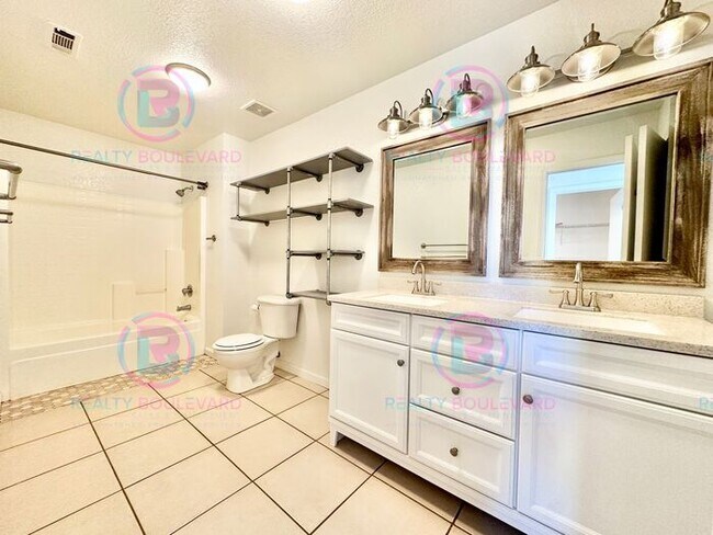 Building Photo - Gorgeous 4BR Home with Granite Counters, Open-Concept Living & 2 car garage