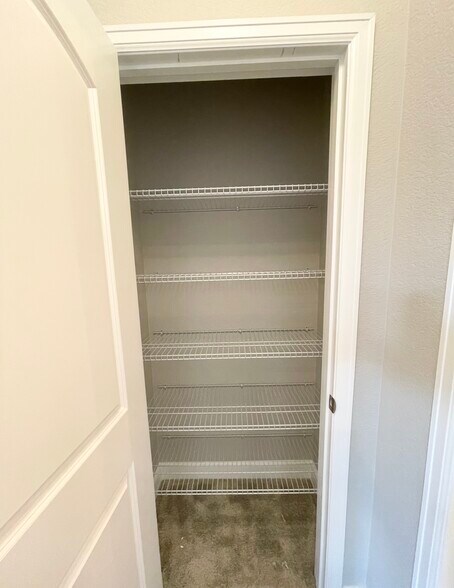 Hall closet located b/w master bedroom 1 & bathroom - 3009 Eagle Wing Way