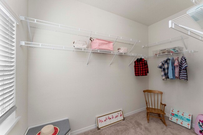Building Photo - Introducing a captivating 3-story townhome...