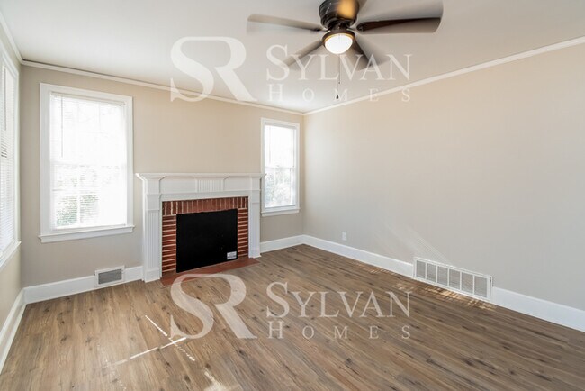 Building Photo - The living is easy in this 3 bedroom, 2 bathroom brick home