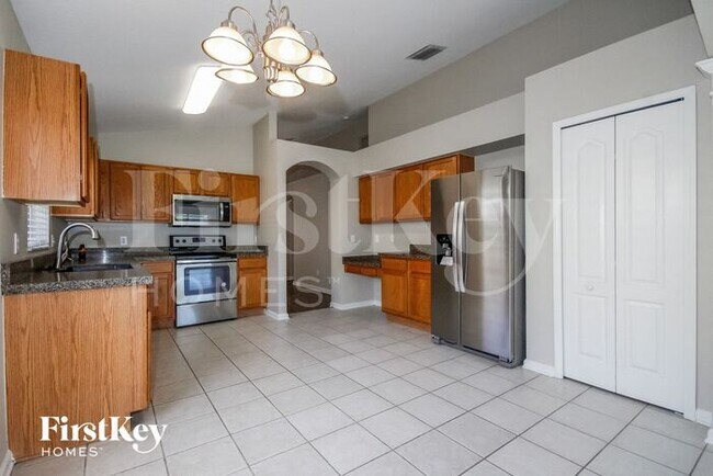 Building Photo - 10214 Hunters Haven Blvd
