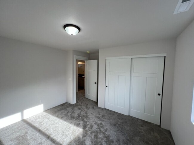 Building Photo - ALMOST NEW CONSTRUCTION/ 4 BEDROOM IN NEWER UPCOMING NEIGHBORHOOD