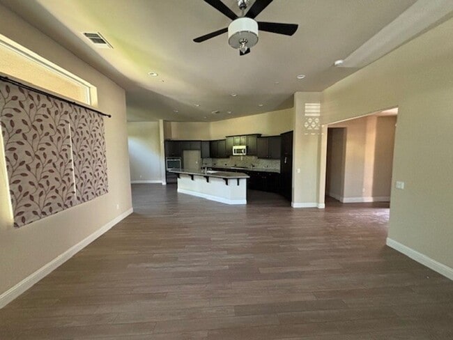 Building Photo - Move-In Ready: Elegant 4-Bedroom Home with Paid Solar in Gated Community