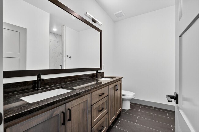 Building Photo - MUST SEE TOWNHOMES IN AMMON RIGHT OFF BEAC...