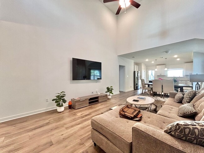 Building Photo - Inviting 4-Bed, 2.5-Bath Home with High Ceilings and Covered Deck