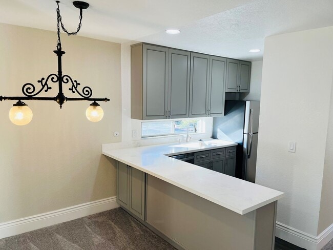 Building Photo - Upper Level Condominium in Station West
