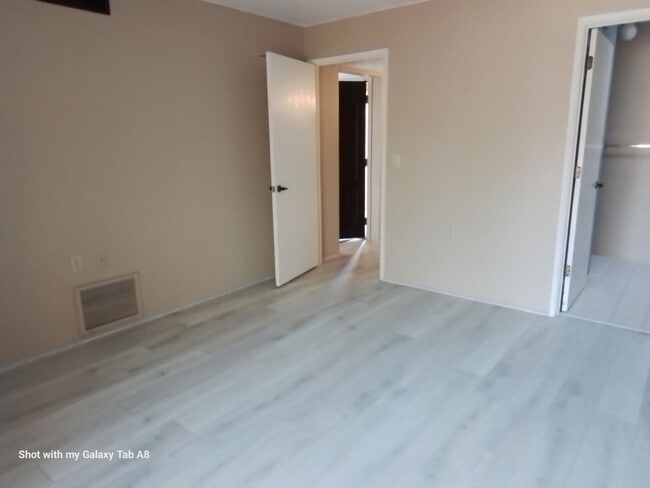 Building Photo - Unfurnished end unit townhome  55 and older community