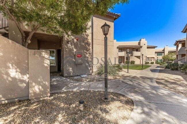 Building Photo - 9451 E Becker Ln