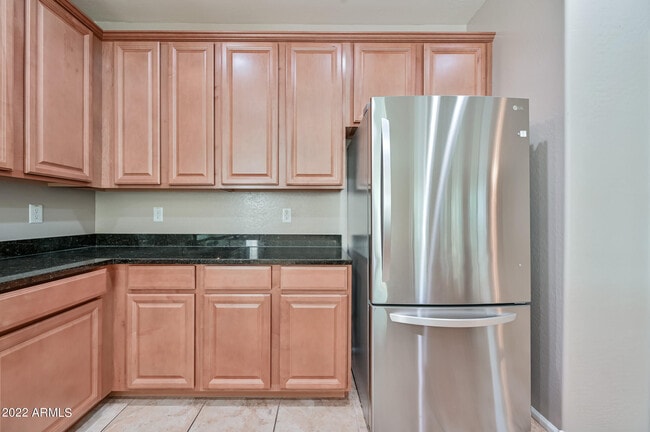 Building Photo - 8767 W Fleetwood Ln