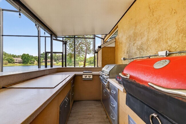 Building Photo - Available Now! Waterfront Living at Its Best – Pool, Decks & Gated Privacy
