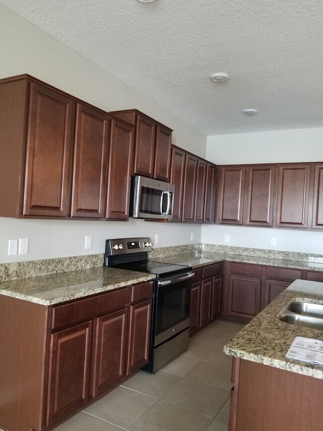 Building Photo - Feel Like You’re On Vacation In This Move-...