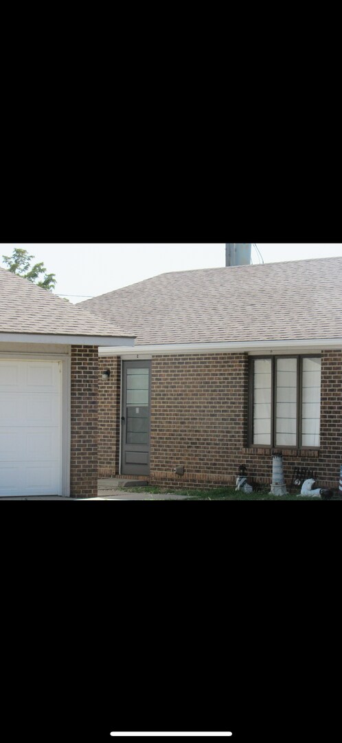 Building Photo - 1801 E 24th Ave