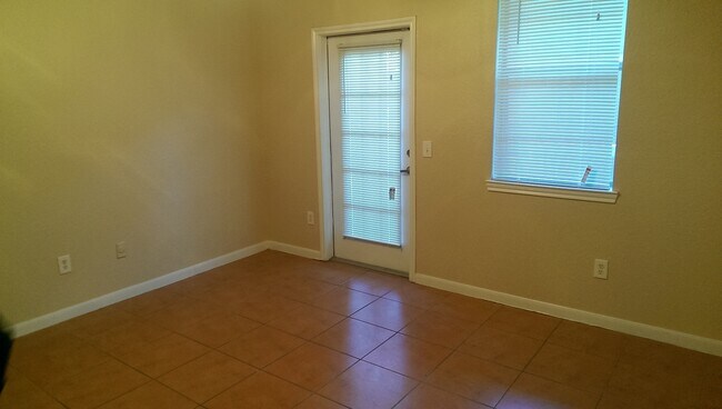 Building Photo - Gorgeous 1/1 with all tile floors and Balcony!