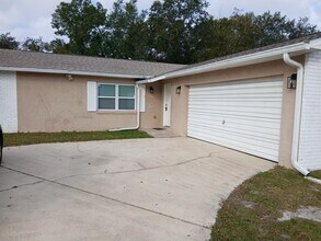 Building Photo - Remodeled, 4 Bedroom, 2 Bathroom close to schools, shopping and highways ...