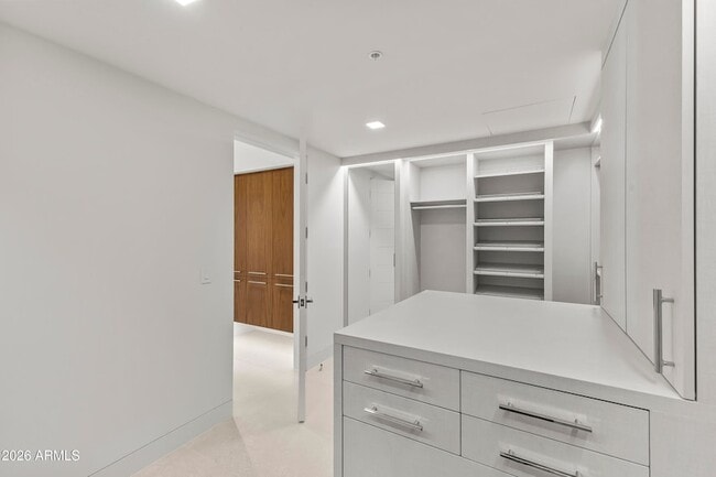 Building Photo - 6587 N Palmeraie Blvd