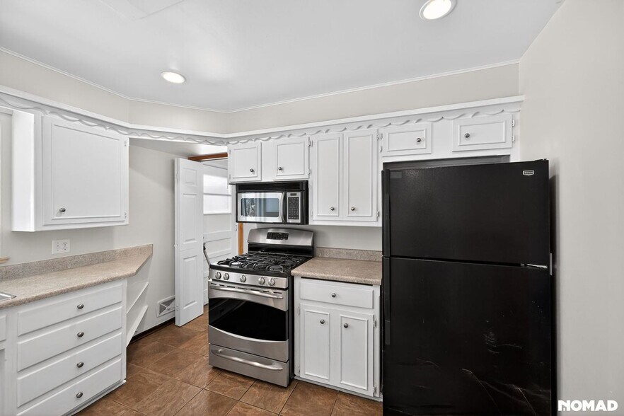 Building Photo - 9524 W 64th Ave