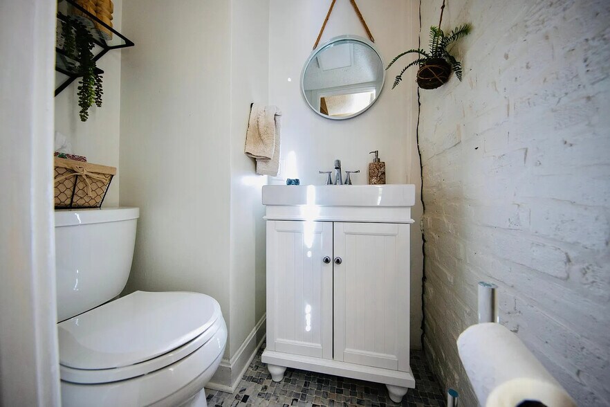Half bath conveniently located on the entry level - 594 Briggs St