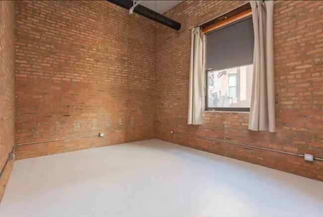Building Photo - 215 N Racine Ave