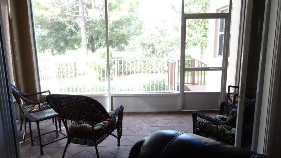 Raised brick screened back patio - 979 West Skyview Crossing Drive