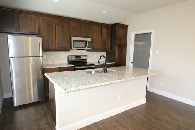 Building Photo - 1308-1312 White Sand Dr.