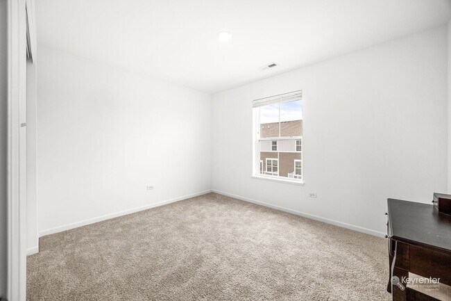 Building Photo - Brand-New End-Unit Townhome w/ Pond Views – Keller Farm, Plainfield!