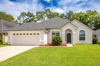 Building Photo - Stunning home in desirable neighborhood