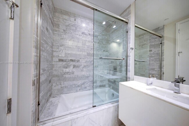 Building Photo - 10203 Collins Ave