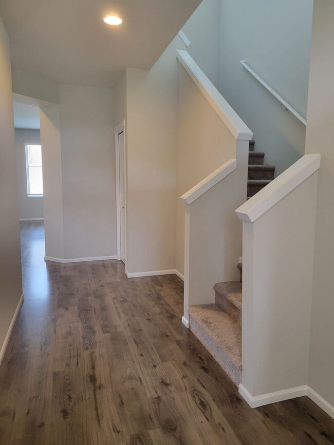 Building Photo - 3 bedroom home with 3 car garage on corner...
