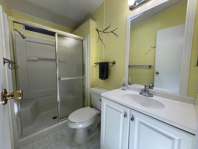 Building Photo - 2 BR 2 BATH Annual Rental in Barefoot Bay Available JUNE 2025