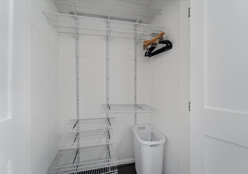Adjustable closet system in the first bedroom - 706A W Glebe Rd