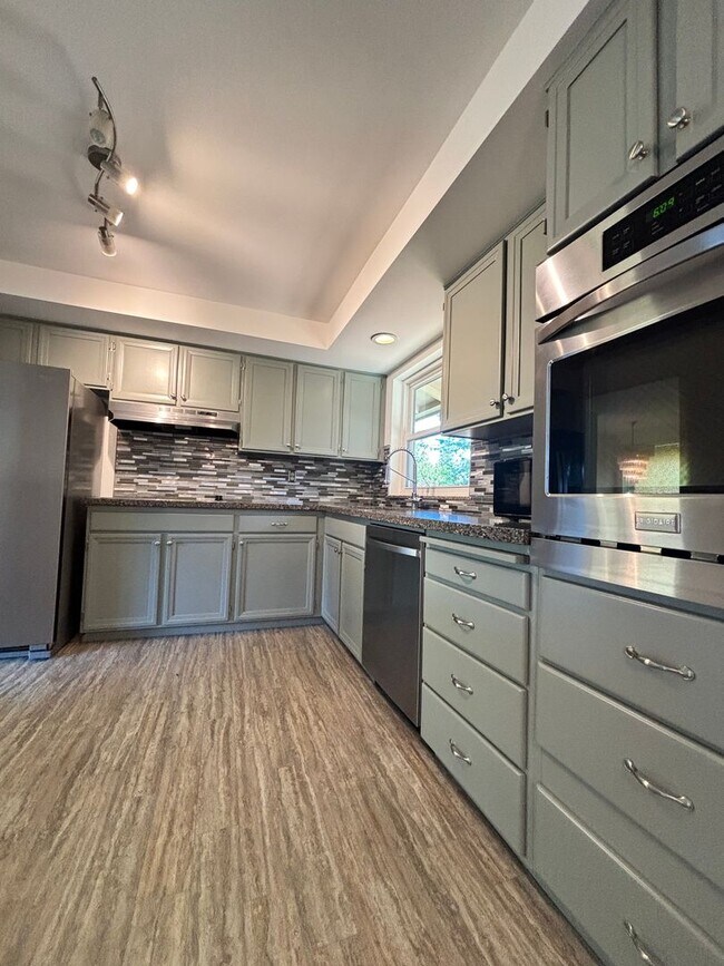 Building Photo - Gorgeous 4-Bd House | Huge Deck, Huge Fenced Yard, & Bonus Room!