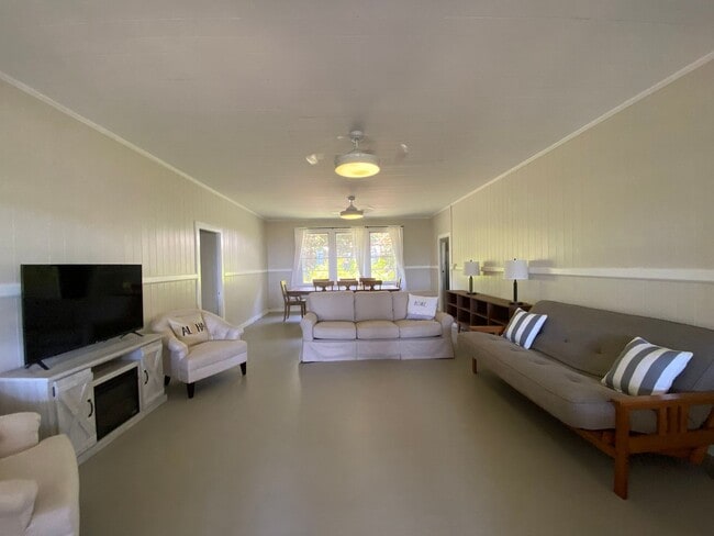 Building Photo - Furnished Plantation Home with 3 Bedrooms, 2 Bath large enclosed porch on almost 2 acres with oce...