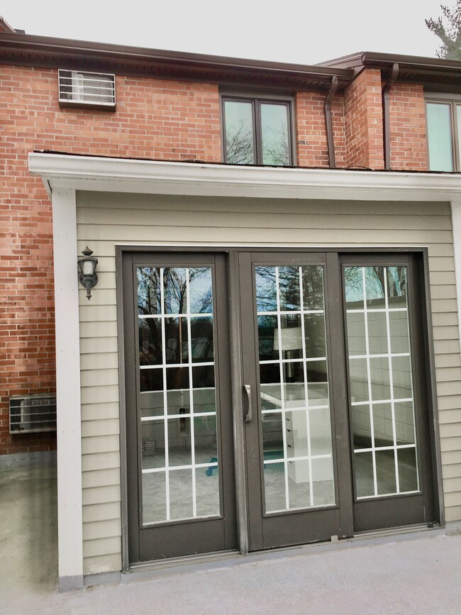 exterior of sunroom from deck - 6 Sutton Ct