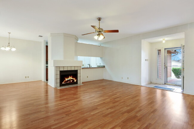 Building Photo - "Cozy 3-Bedroom Retreat with Fireplace Cha...