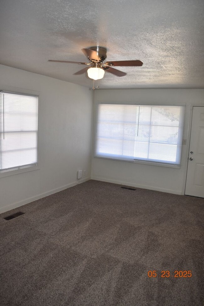 Building Photo - Charming Three Bedroom Home with New Carpe...