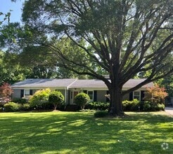 Building Photo - Charming 4-Bedroom Home with Screened Porc...