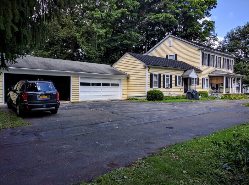 Garage with automatic door - 92 S Main St