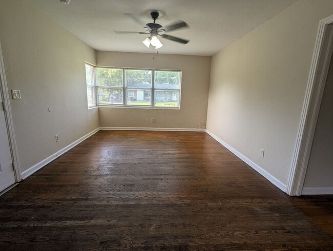 Building Photo - REAR DECK WITH LARGE, FENCED BACKYARD - Th...