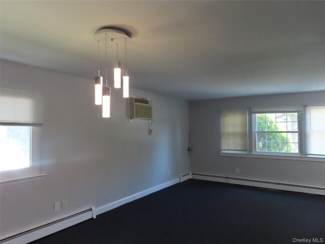 Building Photo - 1210 Smithtown Ave