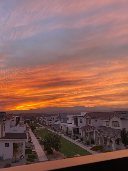 Mountain views from balcony with SPECTACULAR sunsets. - 5801 S Garnet Dr