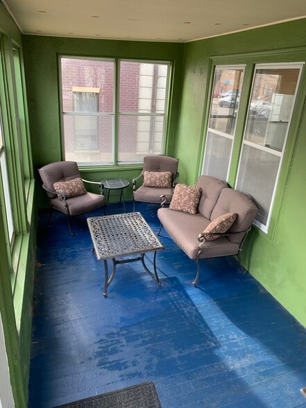 Insulated three-season front porch. - 3032 grand ave