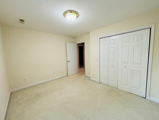 Building Photo - * RE-RENTAL AVAILABLE 7/15/26 * 3 Bedroom 2.5 Half Bath Townhouse with 2 Car Garage