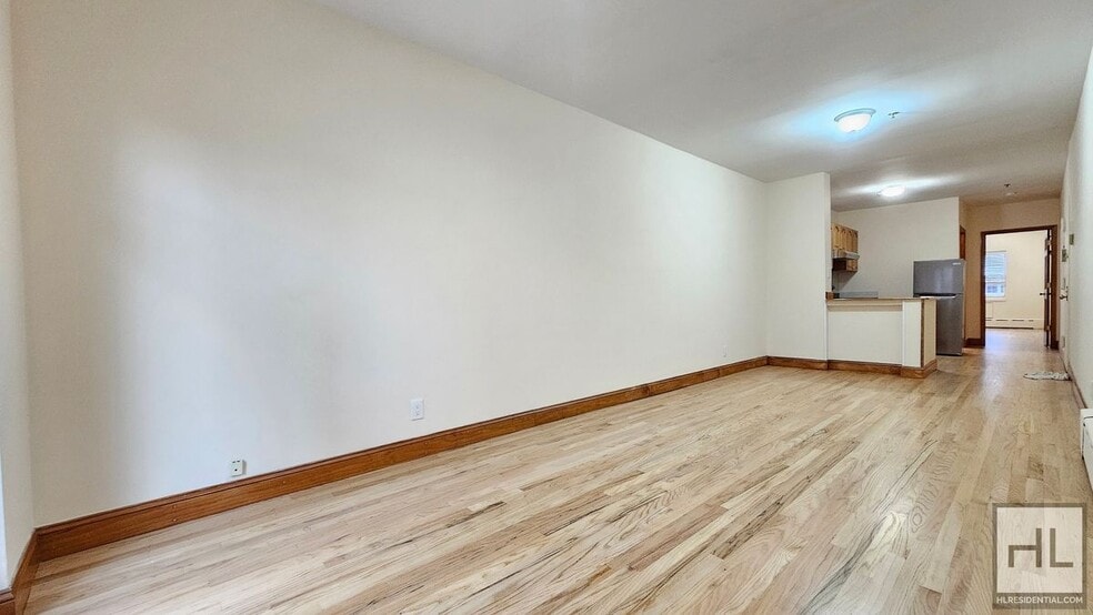 Building Photo - Renovated 1-Bedroom with Balcony | 2nd Floor | Prime Woodside/Sunnyside Location
