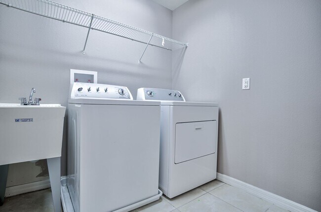 Building Photo - MOVE IN SPECIAL- Beautiful 3/3 w/ 2 Car Ga...