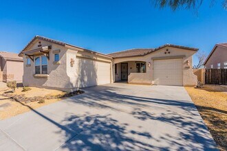 Building Photo - Four Bedrooms, 3 Car Garage - New flooring!