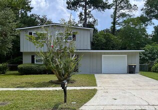 Building Photo - 8109 Mc Glothlin St