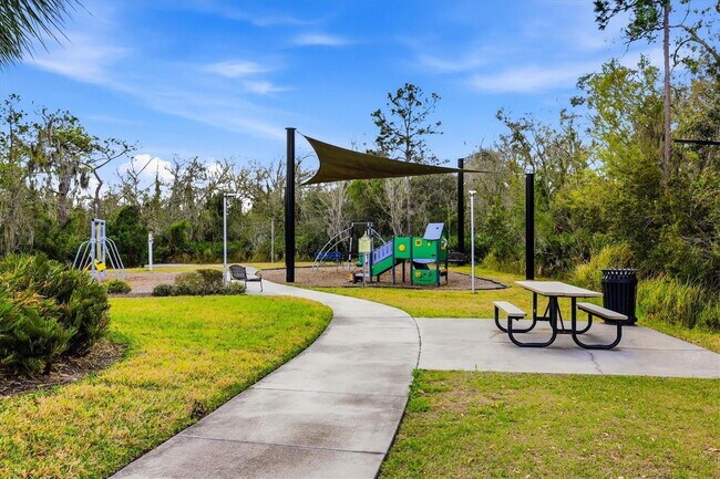 Building Photo - "Charming 3-Bedroom Home with Elegant Granite Touches in Wimauma!" Community pool! Fitness center...